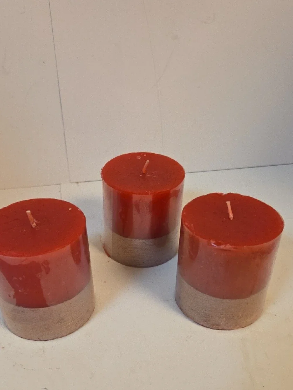 Two-Tone Red and Tan Pillar Candle Trio